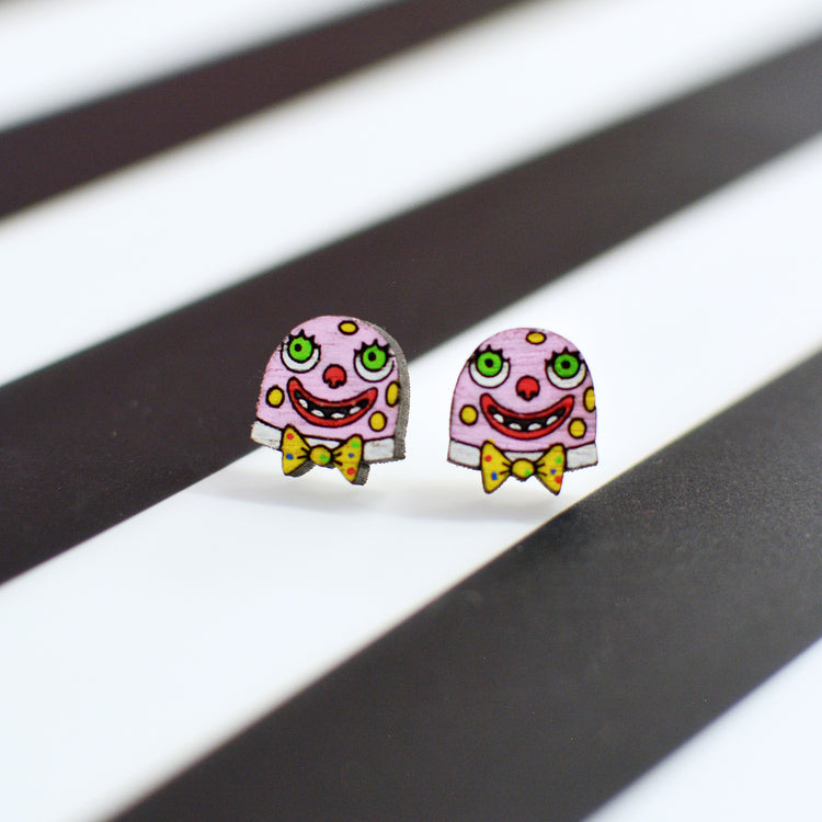 Matching Mr Blobby stud earrings featuring his pink face with yellow spots, big green eyes, a cheesy grin and a yellow polka dot bow tie.
